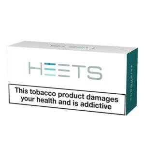<h1>TURQUOISE LABEL HEETS IQOS</h1> IQOS HEETS TURQUOISE LABEL offers a refined and balanced tobacco experience, tailored for discerning users who appreciate a smooth and sophisticated flavor profile. These sticks are designed to be compatible with all IQOS devices, ensuring a consistent and enjoyable smoking experience. <strong>Flavor Profile:</strong> HEETS TURQUOISE LABEL presents a harmonious blend of rich tobacco with subtle nutty undertones and a hint of refreshing menthol. The smooth and balanced flavor profile makes it an ideal choice for those seeking a mellow and satisfying smoking experience without overpowering notes. <strong>YOU CAN EXPLORE MORE IQOS ILUMA HEETS <a href="https://rockstarvapor.co/product-category/iqos-heets-pakistan/" target="_blank" rel="noopener">HERE!</a></strong> <p class="selectable-text copyable-text iq0m558w g0rxnol2" dir="ltr"><span class="selectable-text copyable-text">At Rockstar, we believe every purchase is an experience of convenience, quality, and satisfaction.</span></p> <p class="selectable-text copyable-text iq0m558w g0rxnol2" dir="ltr"><span class="selectable-text copyable-text jv8stmnn">*</span><b><strong class="selectable-text copyable-text nbipi2bn">Price Match Guarantee:</strong></b><span class="selectable-text copyable-text jv8stmnn">*</span><span class="selectable-text copyable-text"> We’re committed to offering you the best value on your purchases. If you find a lower price on an identical item from a competitor, simply let us know, and we’ll beat it.</span></p> <p class="selectable-text copyable-text iq0m558w g0rxnol2" dir="ltr"><span class="selectable-text copyable-text">Shop with confidence, knowing that you’re getting the best deal possible. Enjoy the ease of browsing and purchasing from the comfort of your home, Explore our catalog, place order, and get doorstep delivery. Our knowledgeable and friendly team is here to assist you with your order to make your shopping enjoyable,</span></p> <p class="selectable-text copyable-text iq0m558w g0rxnol2" dir="ltr"><span class="selectable-text copyable-text">We are located just around the corner in <a href="https://www.google.com/maps?ll=24.797475,67.044777&z=16&t=m&hl=en&gl=US&mapclient=embed&cid=3248600491974334453" target="_blank" rel="noopener">DHA Phase 5</a> & <a href="https://www.google.com/maps/place/Rockstar+Vapor+Co+-+Clifton+(Vape+Store)/@24.8271319,67.0278464,17z/data=!4m14!1m7!3m6!1s0x3eb33d243236324b:0xaa9b07f8edc863c0!2sRockstar+Vapor+Co+-+Clifton+(Vape+Store)!8m2!3d24.8271319!4d67.0304213!16s%2Fg%2F11twsg4yj7!3m5!1s0x3eb33d243236324b:0xaa9b07f8edc863c0!8m2!3d24.8271319!4d67.0304213!16s%2Fg%2F11twsg4yj7?entry=tt" target="_blank" rel="noopener">Clifton Boat Basin</a>, any of our store is your go-to spot for the latest vape gear, trendsetting flavors, and a vibe that’s as chill as it gets.</span></p>